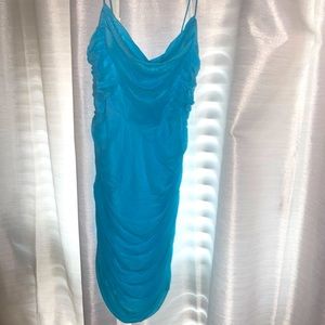 Hello Molly!! Our private soiree dress! Blue, never worn, tags still on!